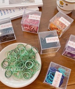 100本のかわいいキャンディーカラーの下地ヘアゴムins乙女心カラーのシュシュゴム女性の髪ゴムひも